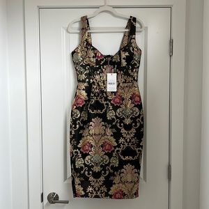 Embroidered corset dress from lavish Alice. Never been worn. Still has the tags.